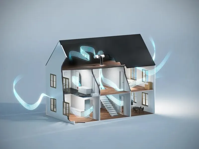 A cutaway of a house showing a loft PIV unit pushing filtered air down through the landing and out through the rooms below